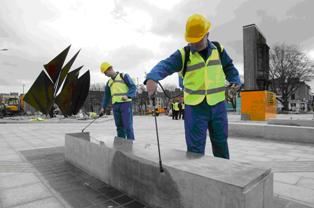 Knights Group crew applying protective coating on concrete structure